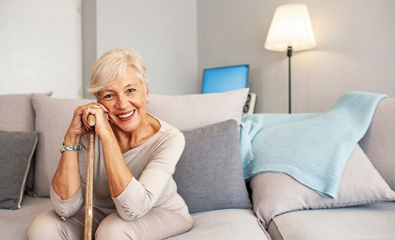 Woman with dentures smiling