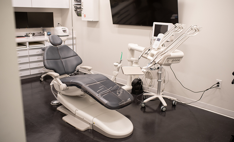 How to Handle Dental Emergencies: a worried person calling an emergency dentist