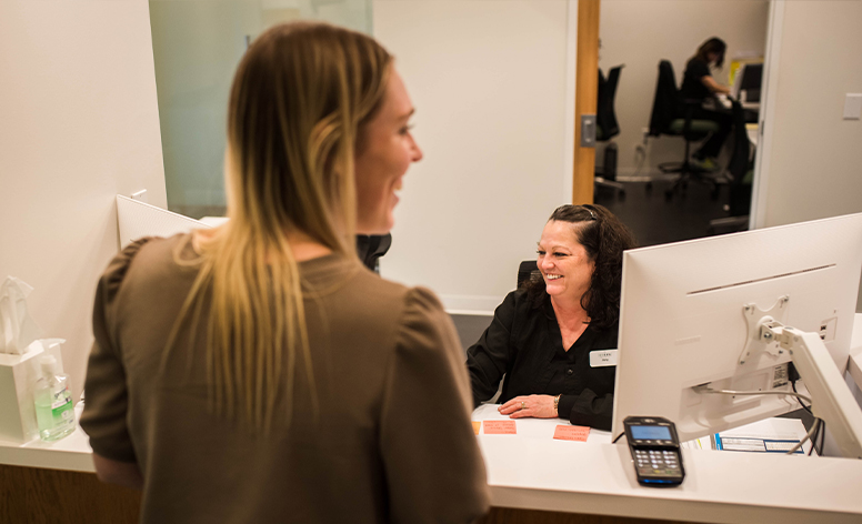 Dentist reviewing dental insurance fundamentals