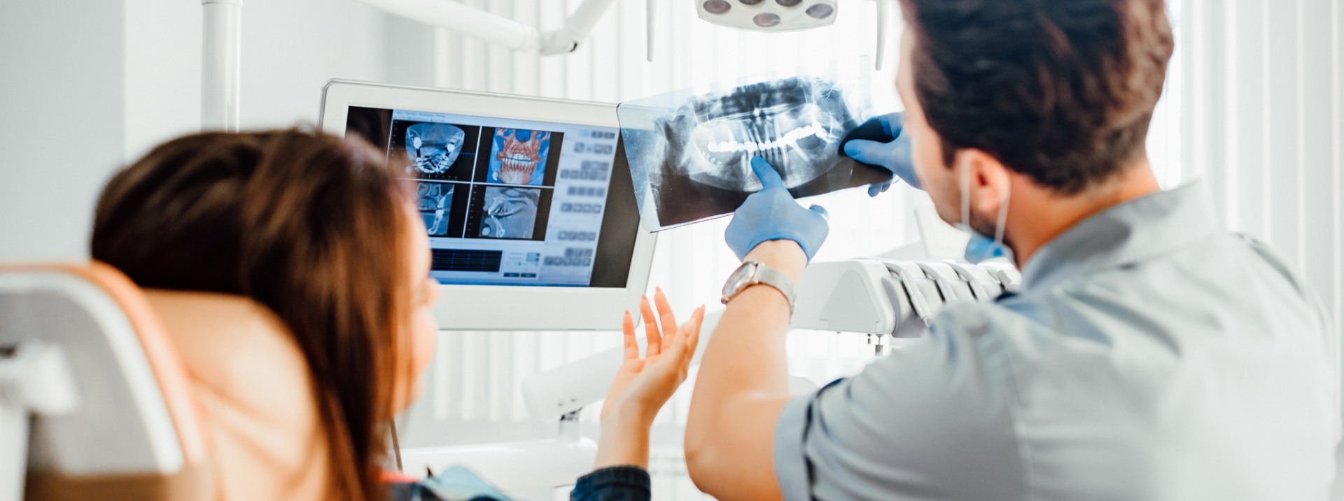 doctor showing patient x ray