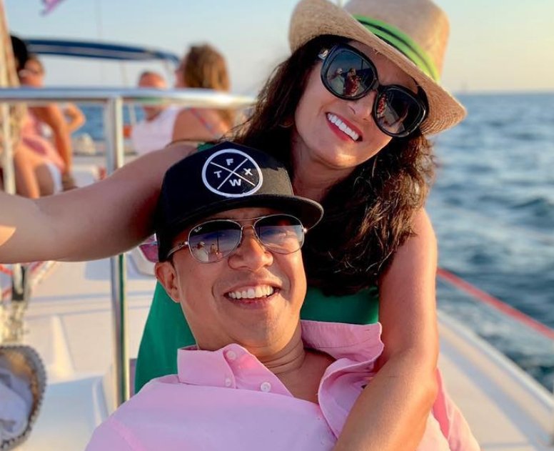 Doctor Cheng and his wife on a boat