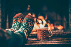 feet warming by fireside