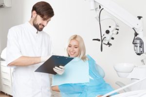 happy woman with dentist 